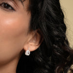 Load image into Gallery viewer, Close-up of a woman's ear wearing a diamond earring with a neutral background