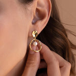 Load image into Gallery viewer, Gold earring with a pearl being worn by a person