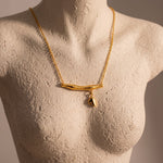 Load and play video in Gallery viewer, Sculptural Wave Pendant Necklace