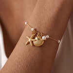 Load image into Gallery viewer, Starfish &amp; Shell Charm Bracelet
