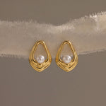 Load image into Gallery viewer, Gold earrings with pearls on a beige ribbon
