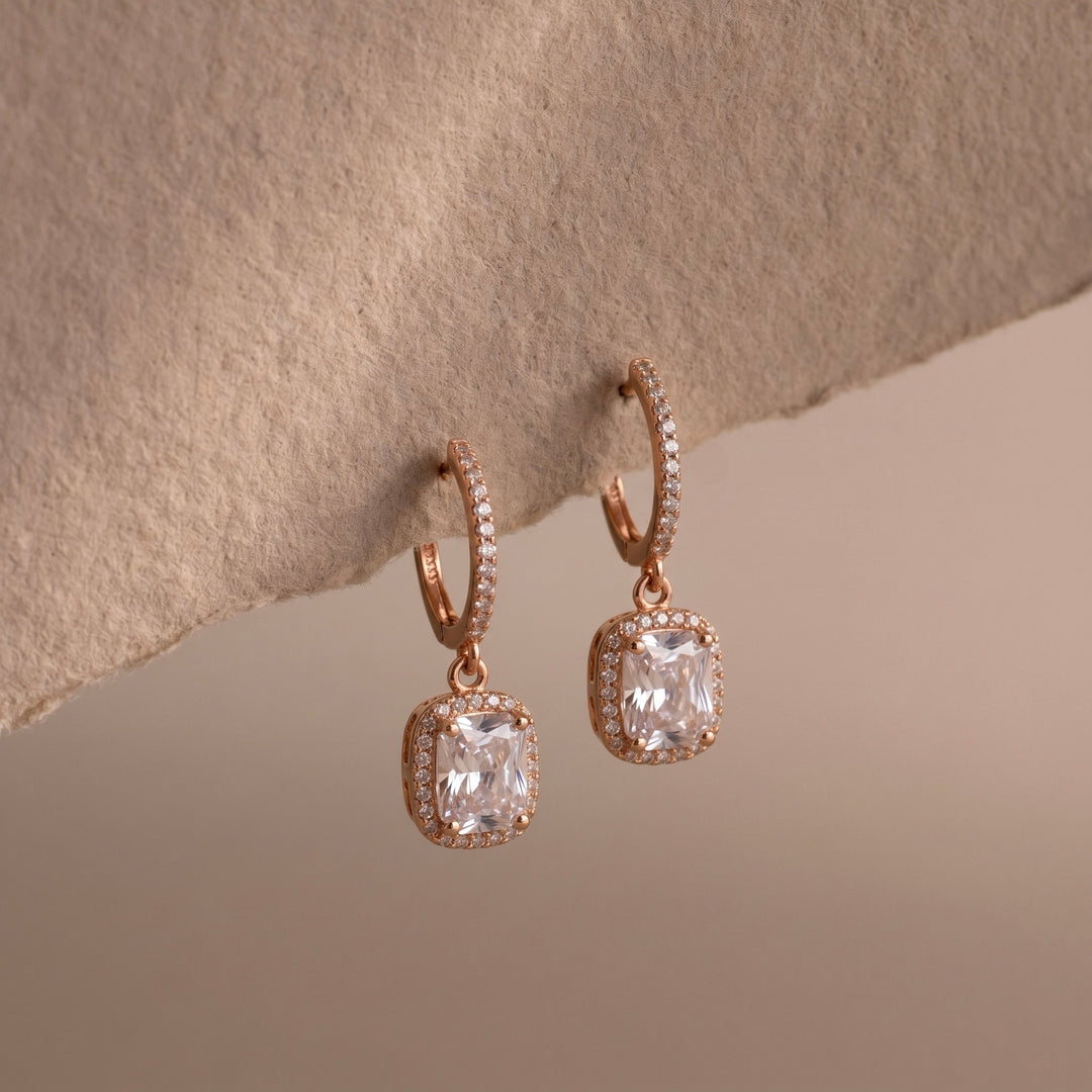 Rose gold earring against each background