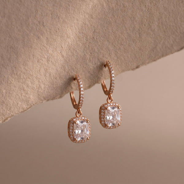 Rose gold earring against each background